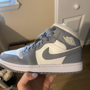 Woman’s Air Jordan 1 Mid “Stealth”